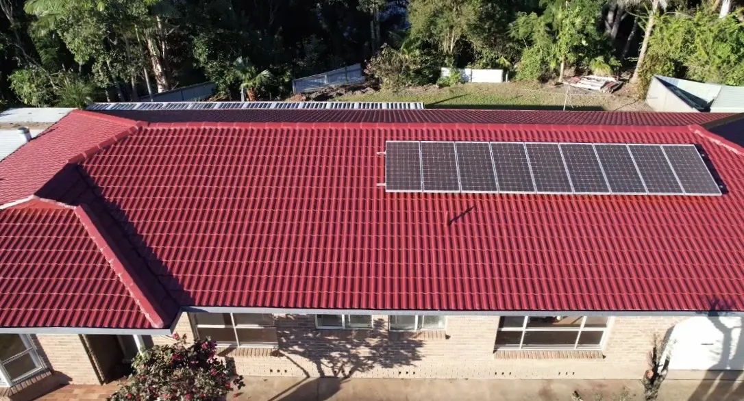 Aerial view of restored red tile roof after Dulux AcraTex coating